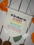 'It is okay to...' Banner